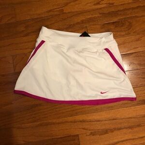 NWT. Nike Tennis Dri-Fit Power Skirt Skort. Attached shorts. White and Pink Sz L